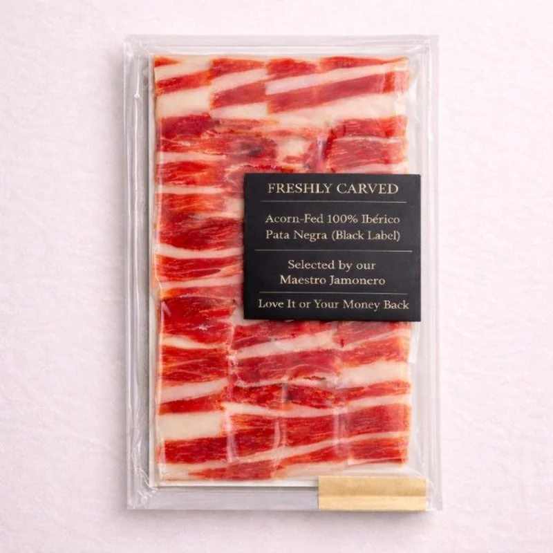 Hand-Carved Jamón 100% Ibérico de Bellota Pata Negra — Freshly Carved vacuum-sealed package